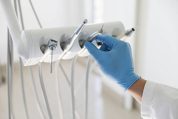 Professional Invisalign Clear Aligners technician working in South Lockport, NY